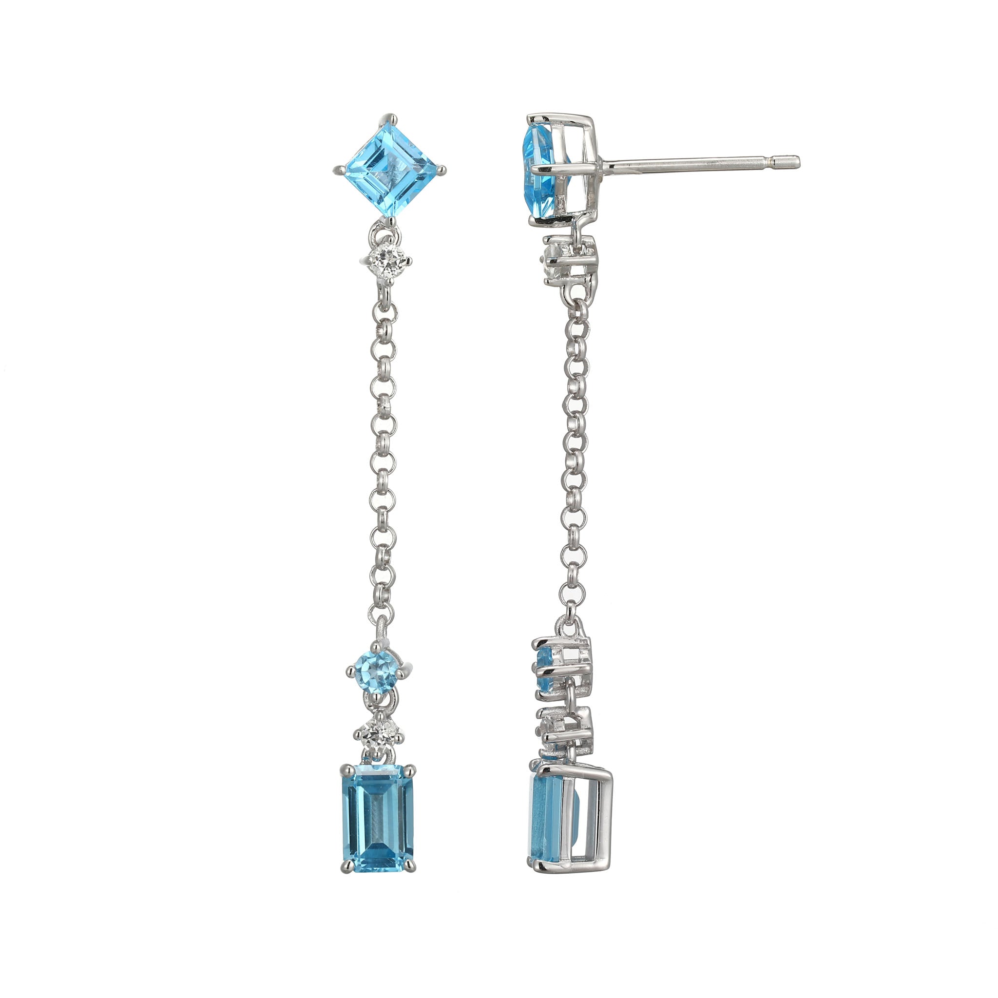 These Blue Topaz Dangle Earrings From The Sway Collection Embody Parisian Luxury. Shimmering Blue And White Topaz Stones Complement Classic Denim Or Elegant Evening Attire.